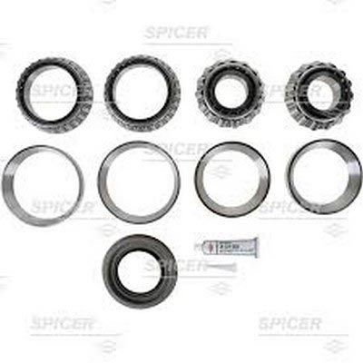 Kit de cojinetes diferencial Spicer con varios anillos metálicos y un pequeño tubo de grasa.