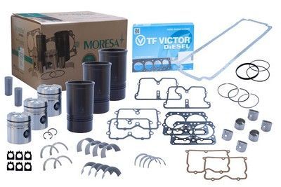Kit de reconstrucción de motor con pistones, juntas y cilindros en una caja.