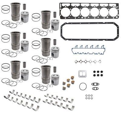 Componentes del kit de reconstrucción del motor: cilindros, pistones, juntas, cojinetes y sellos.