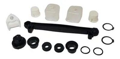 Kit de reparación de fontanería de plástico en blanco y negro con varias piezas, entre ellas una varilla y varios anillos.