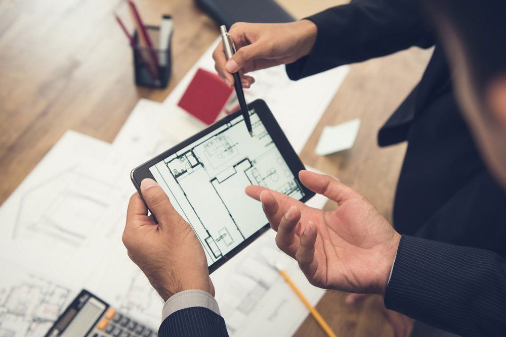 Reviewing Design — Redlynch, QLD — Wes Mansfield Construction