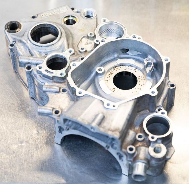 A close up of a motorcycle engine case on a table