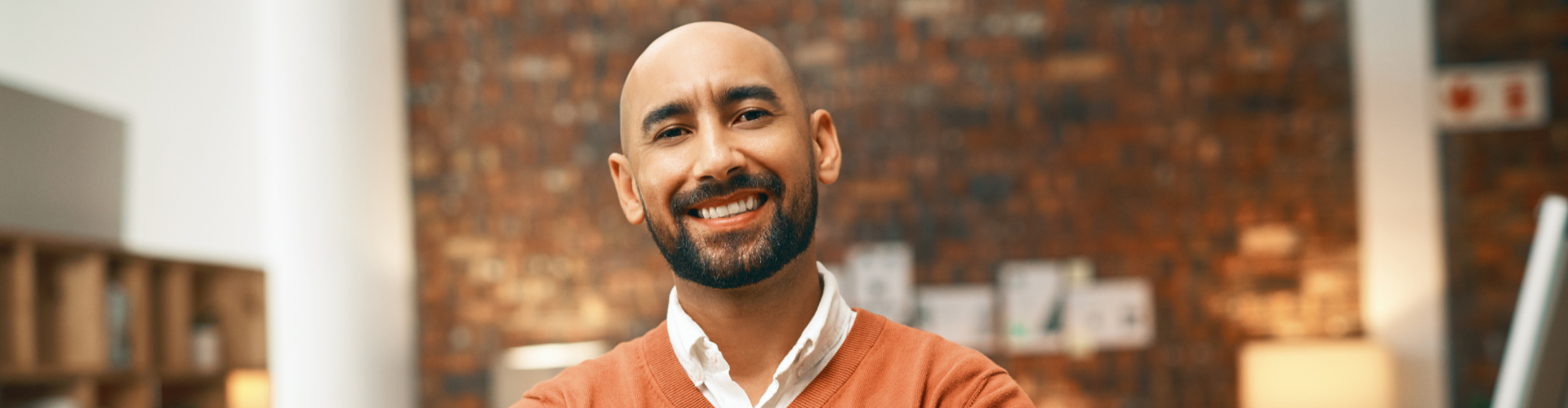 Peoplebank contractor in an orange sweater 