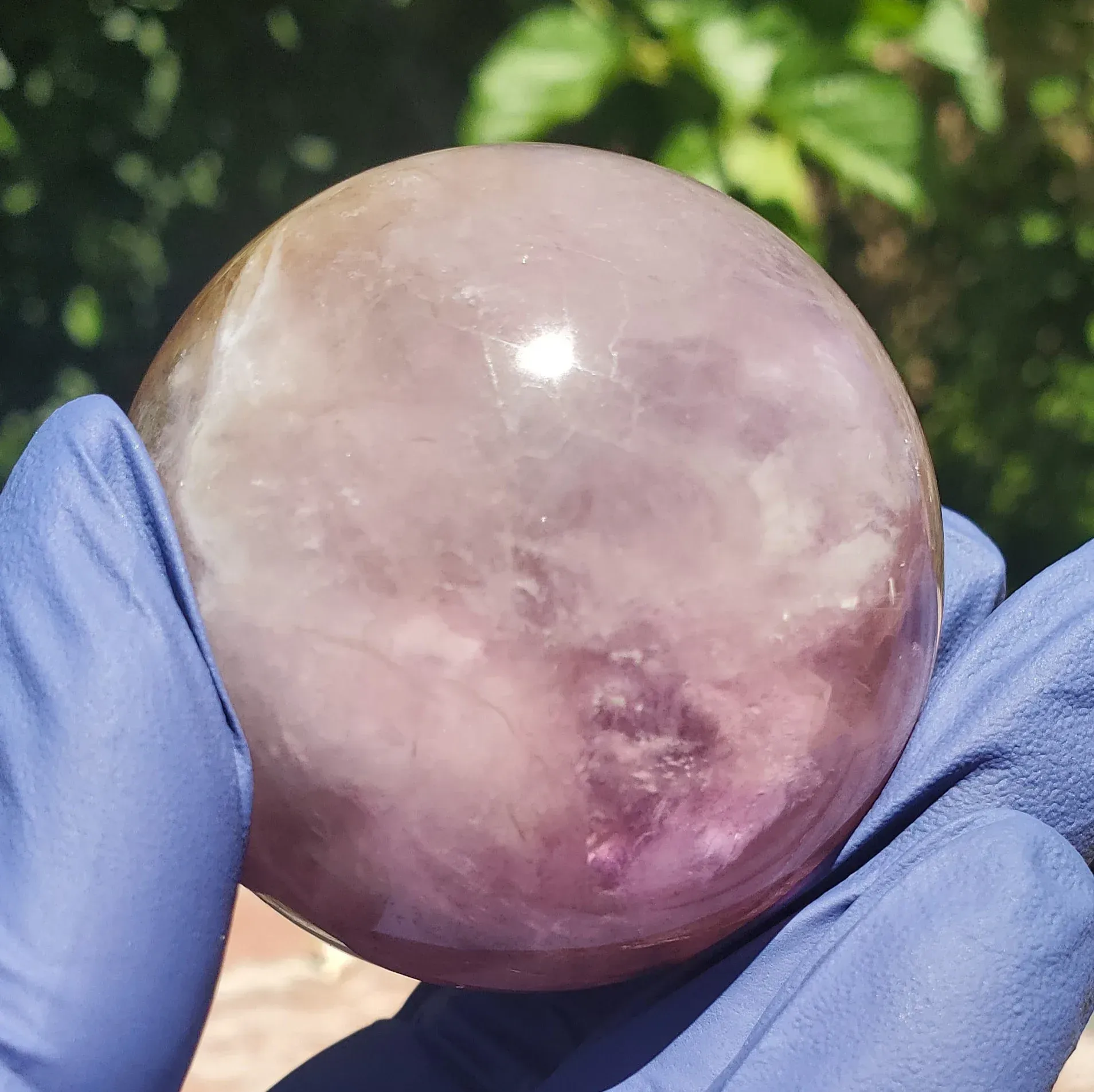 Polished Purple fluorite with a banding smokey white mixture iron and rainbow inclusions 234g