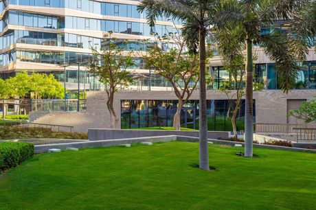 Green lawn and trees.