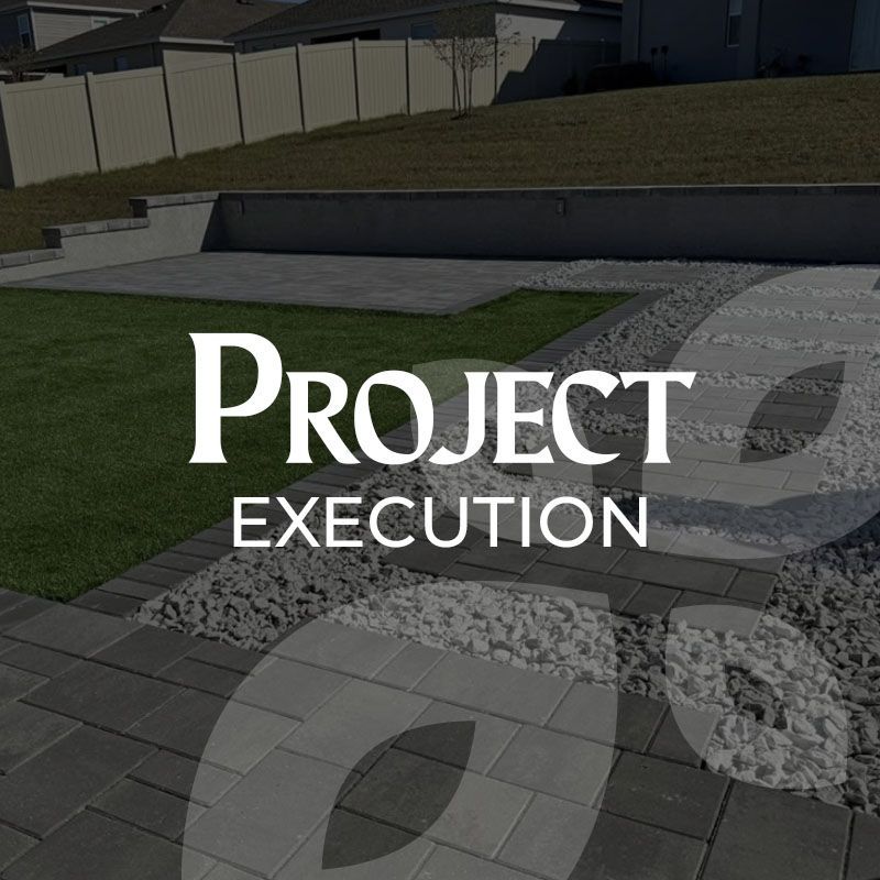 Landscaped backyard with pavers, gravel, and grass, with the text 
