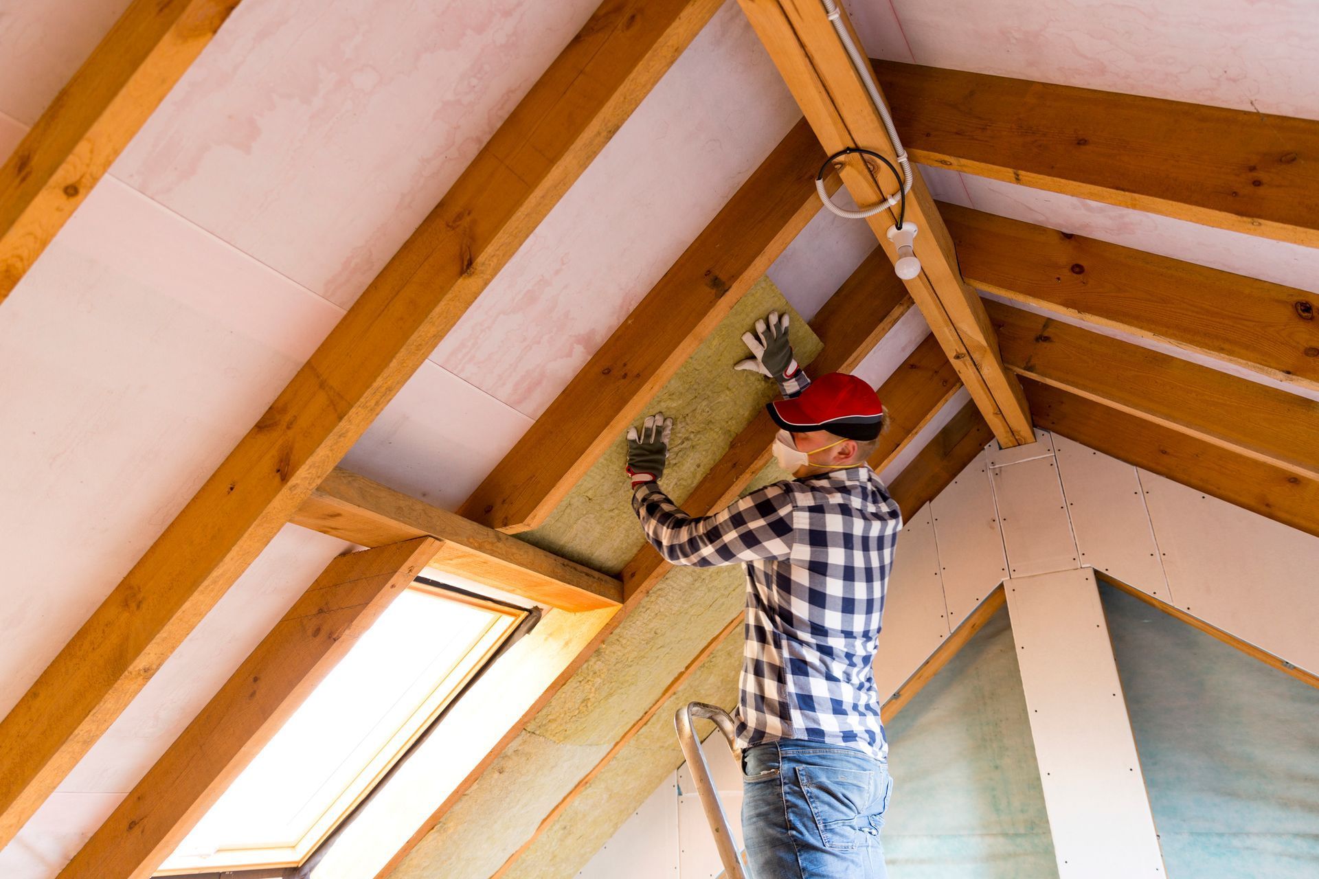 Construction Worker Working on the Ceiling Insulations | East Gosford, NSW | Clark’s Insulations Construction Worker Working on the Ceiling Insulations | East Gosford, NSW | Clark’s Insulations