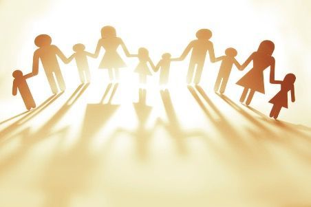 A paper chain of a family holding hands.