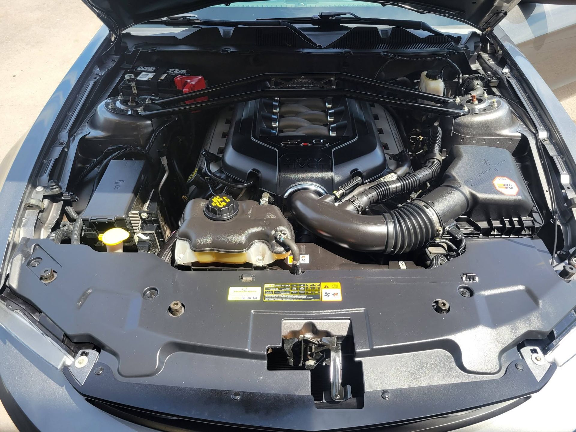 Engine bay detailing before and after by Detail 360