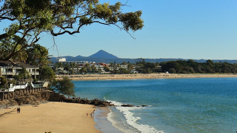 Beach Scene With Sandy Shore — Superstretch300 Limousines in Noosa, QLD