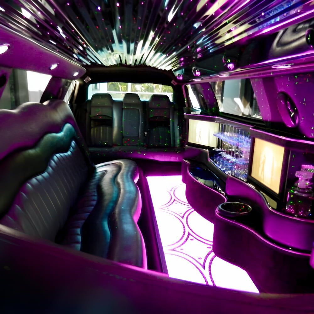 The Inside of a Limousine With Purple Lights on the Ceiling — Superstretch300 Limousines in Sunshine Coast, QLD