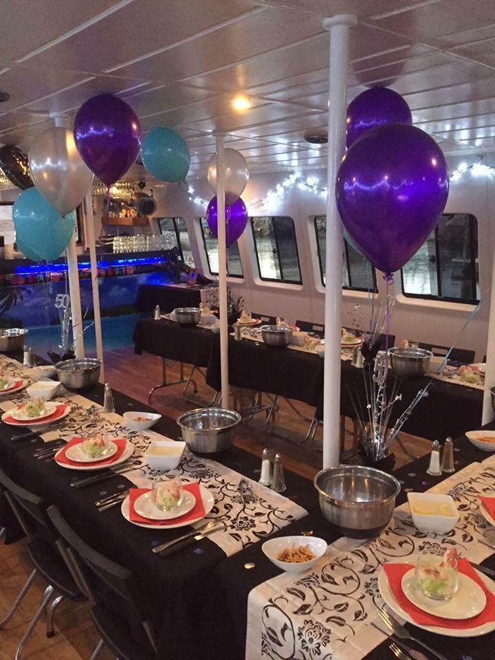 A Long Table is Set for a Party With Purple Balloons — Superstretch300 Limousines in Sunshine Coast, QLD