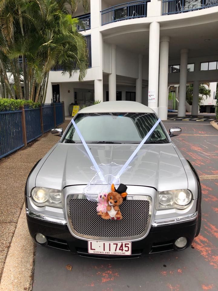 Silver Chrysler Limousine Decorated With Ribbons — Superstretch300 Limousines In Buderim, QLD