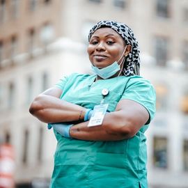 Medical professional in uniform, ideal guest for Workforce Suites.