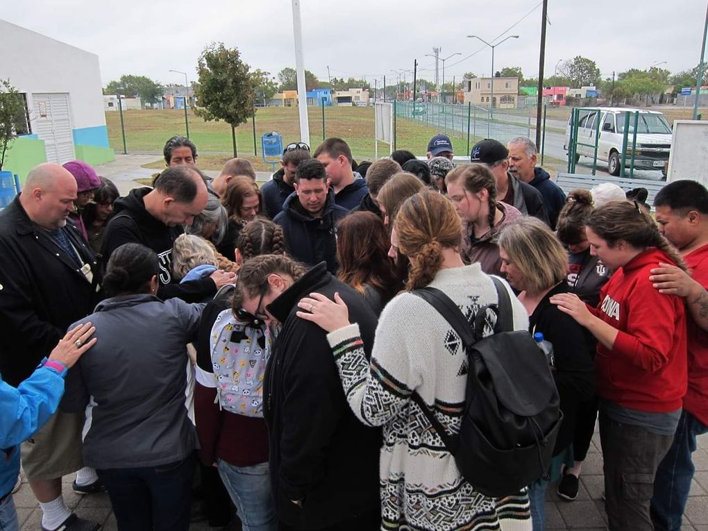Group prayer with missionaries serving in Mexico