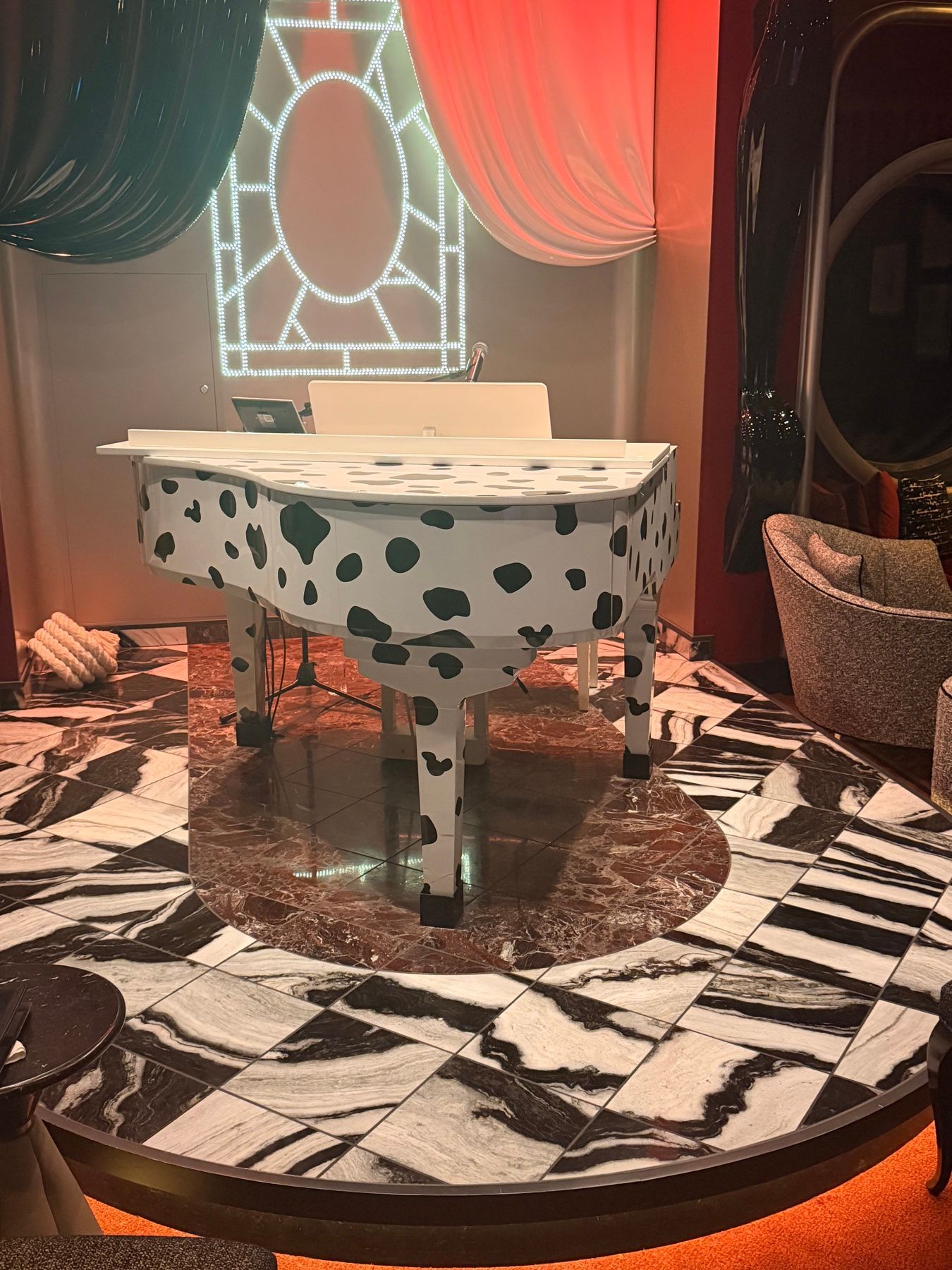 Interior of De Vil's piano bar aboard Disney Destiny