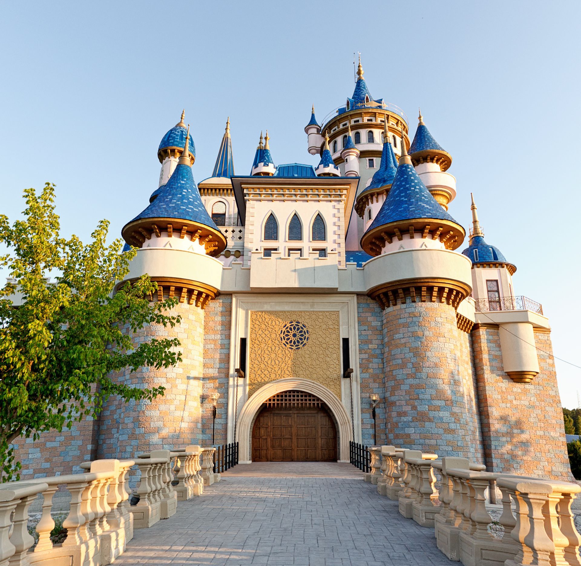A castle with a clock on the front of it