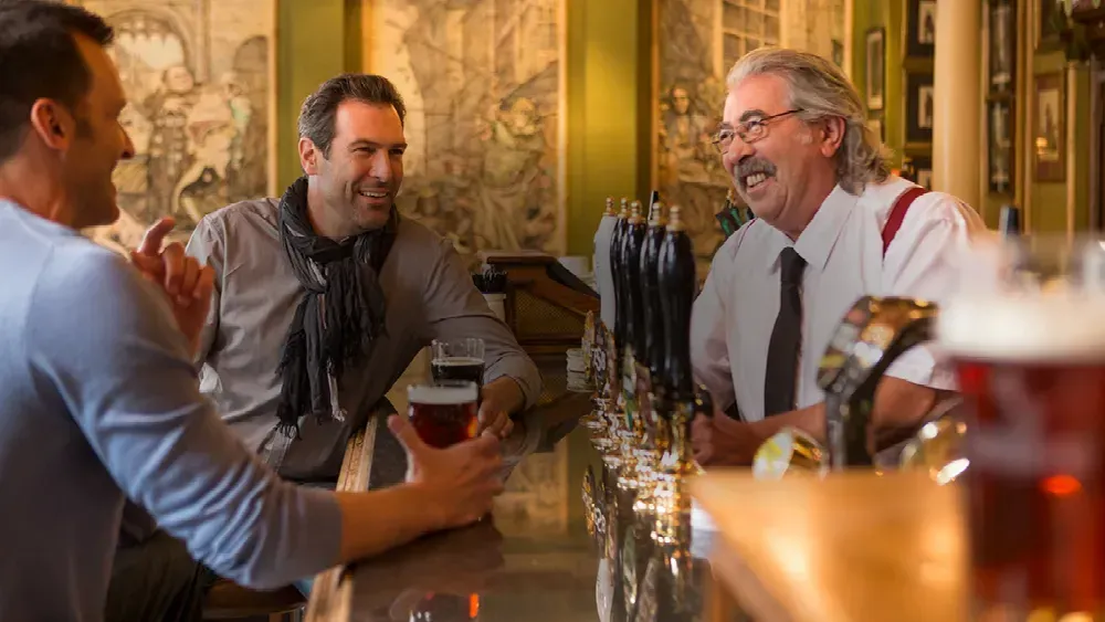 Travelers enjoying a local pub experience