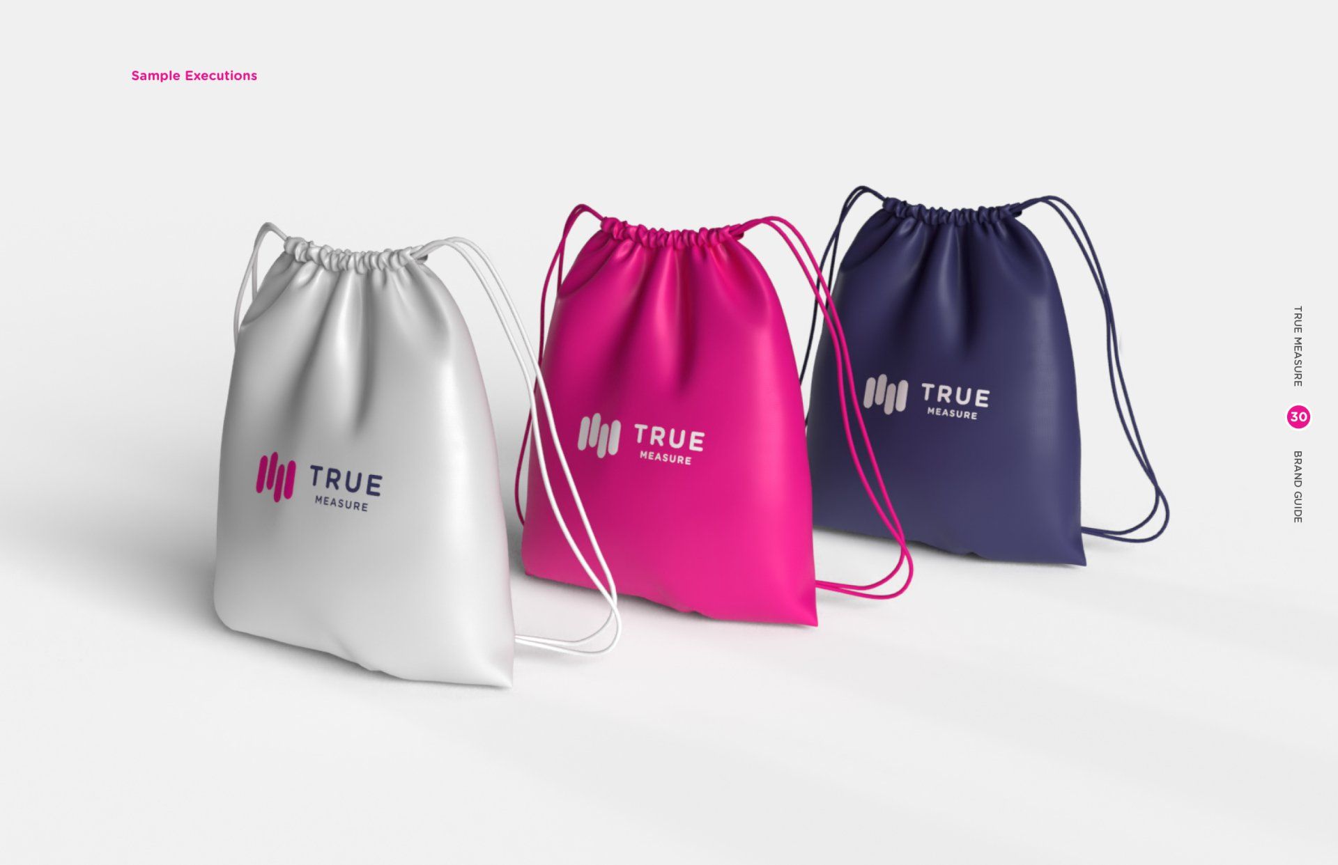 Three drawstring bags are sitting next to each other on a white surface.
