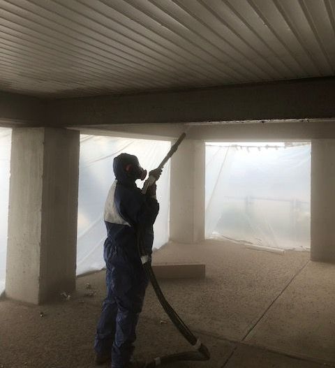 Dry Ice Blasting a brick façade on building