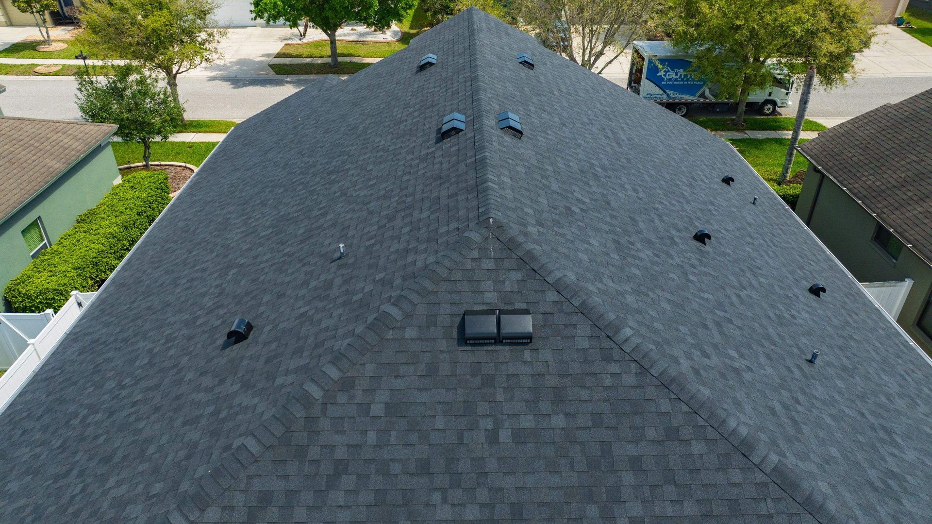 Drone view of roof with CertainTeed Landmark Charcoal Black Shingles.