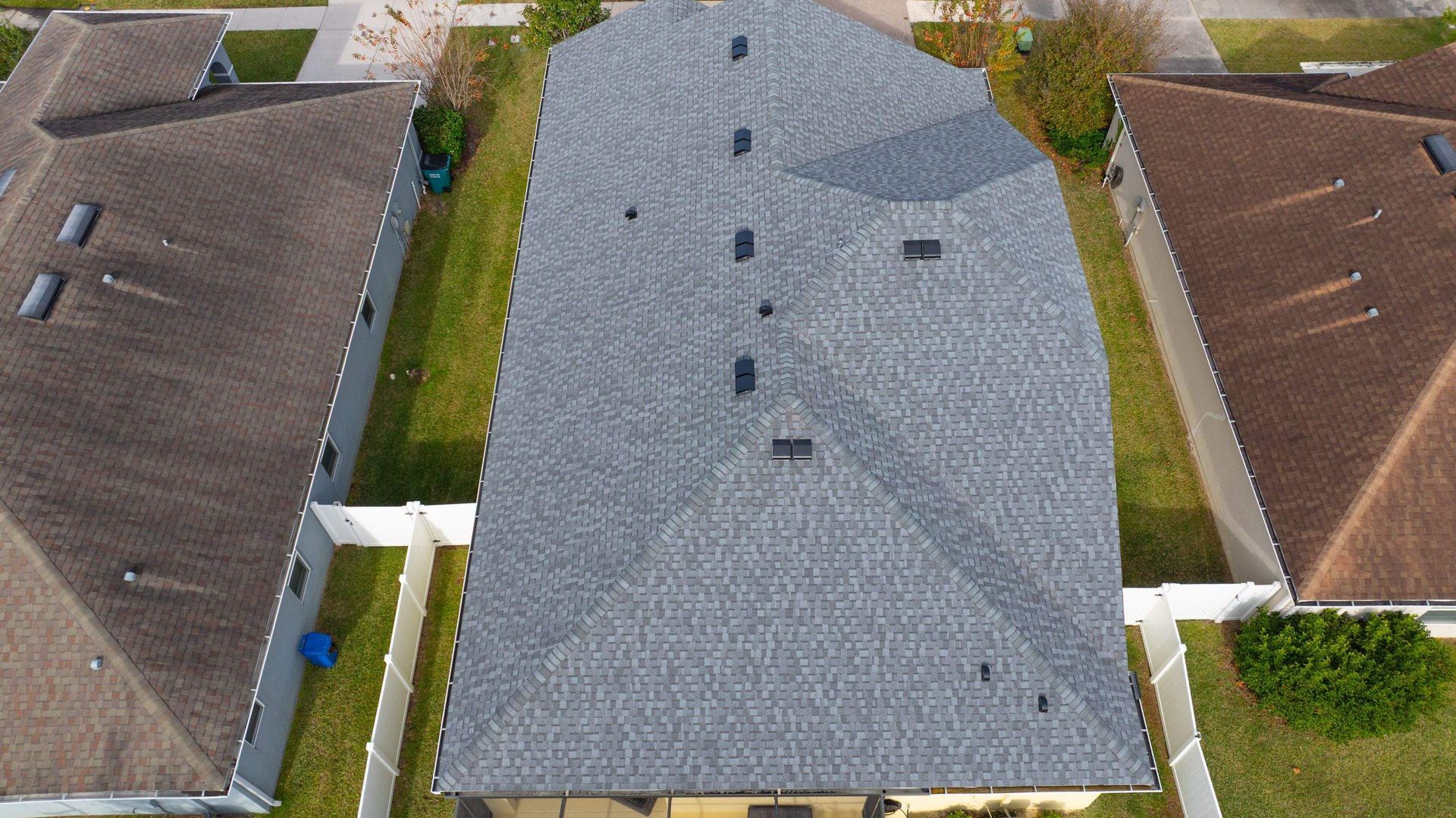 Drone photo of a CertainTeed Landmark Pewter architectural shingle roof replacement in Avalon Park, Wesley Chapel, FL.