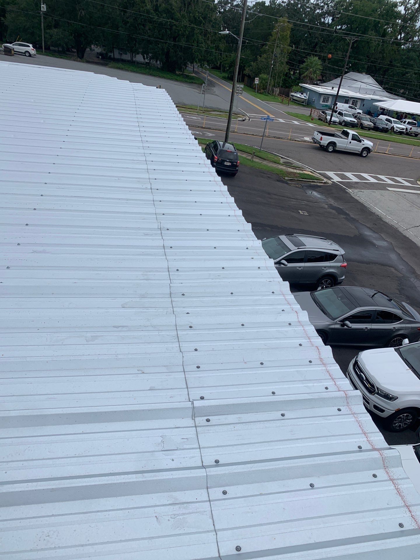 Metal roof repair and fastener replacement in Brooksville Florida