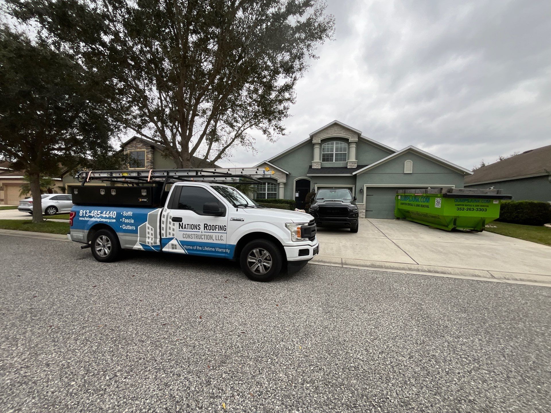 Roof replacement in Oak Creek HOA of Wesley Chapel, FL installed by Nations Roofing & Construction.