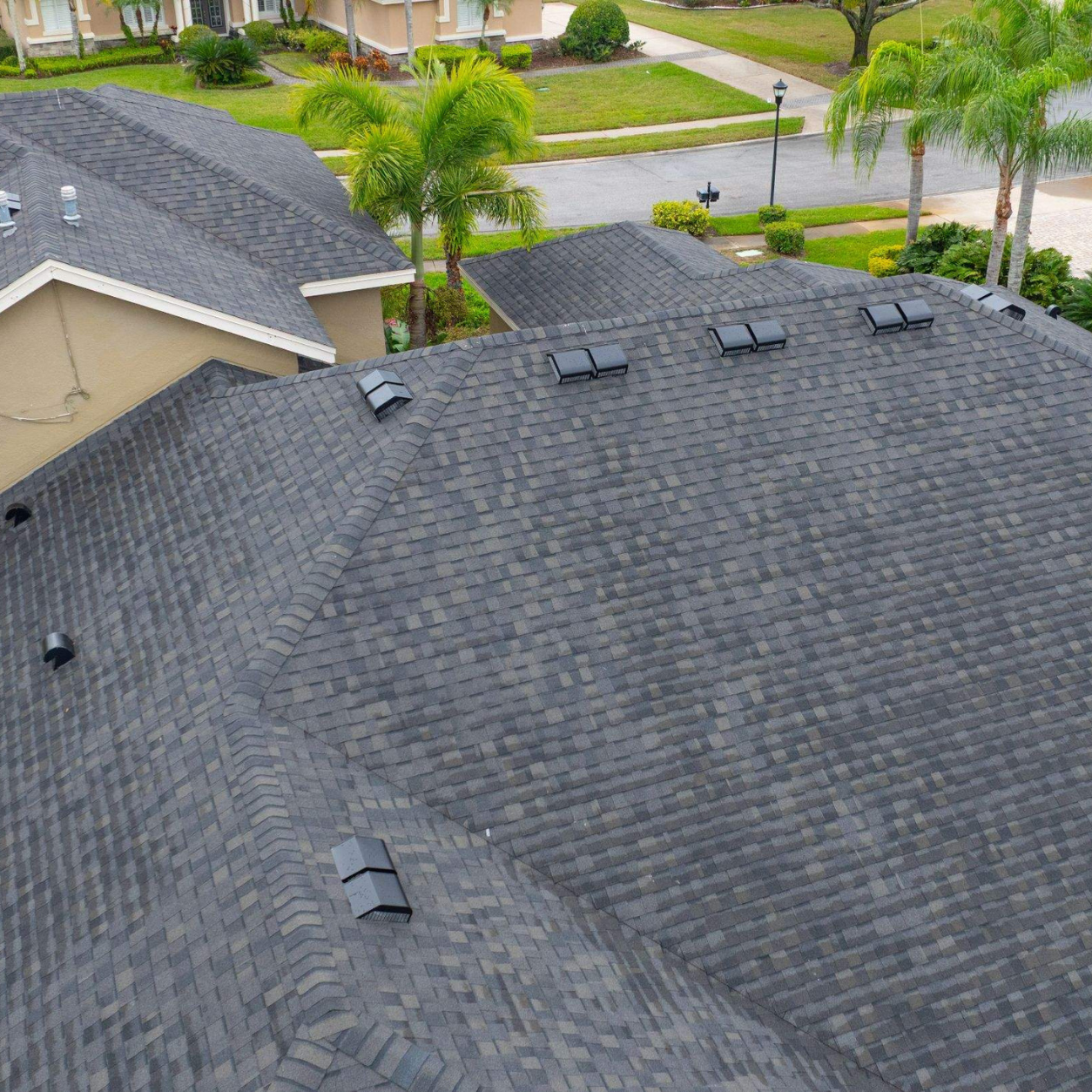 Close-up drone image of a new Landmark Espresso roof showing ridge lines, roof ventilation, and architectural shingles.