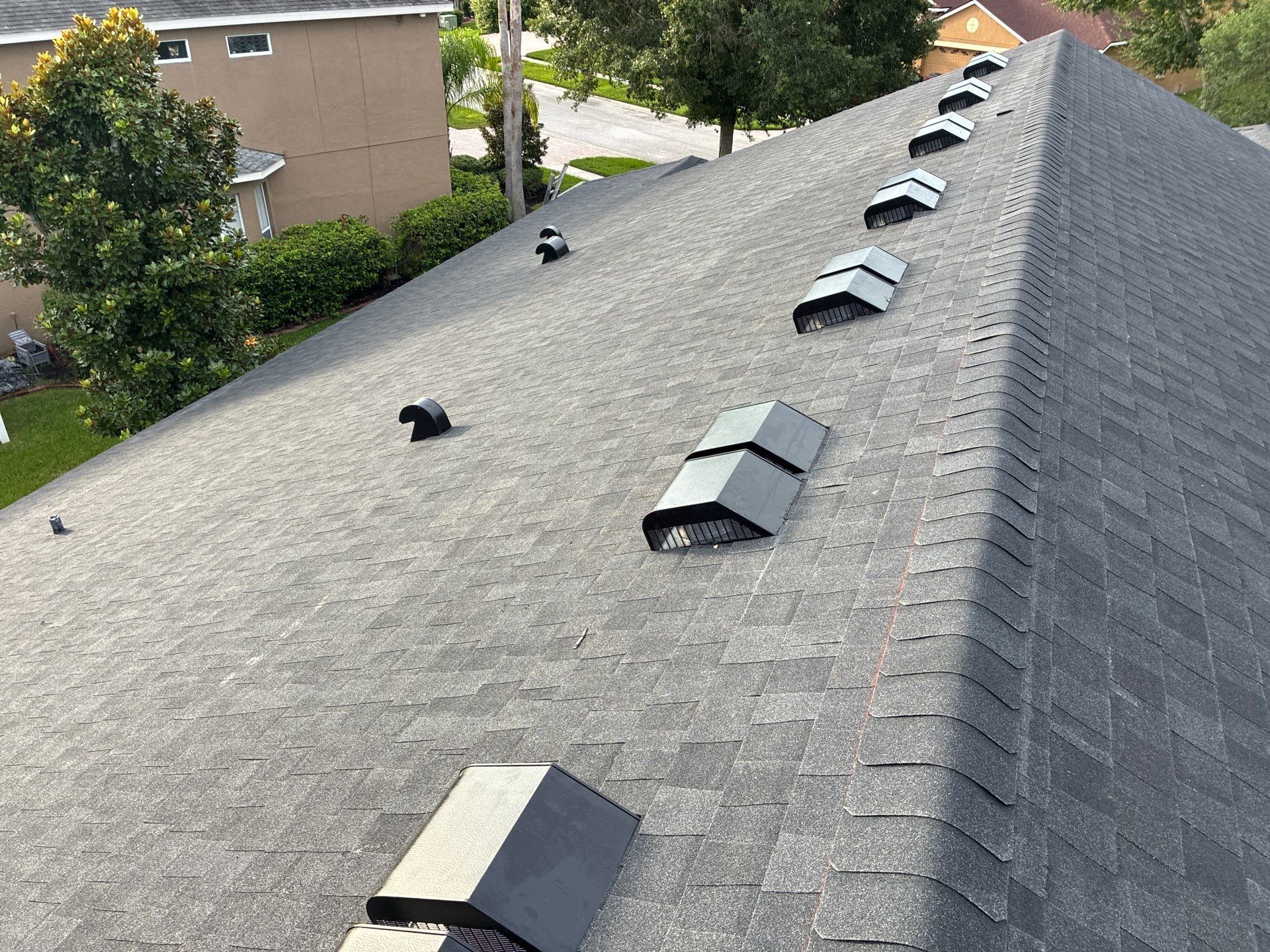 Aging asphalt shingle roof needing replacement in Wesley Chapel Florida