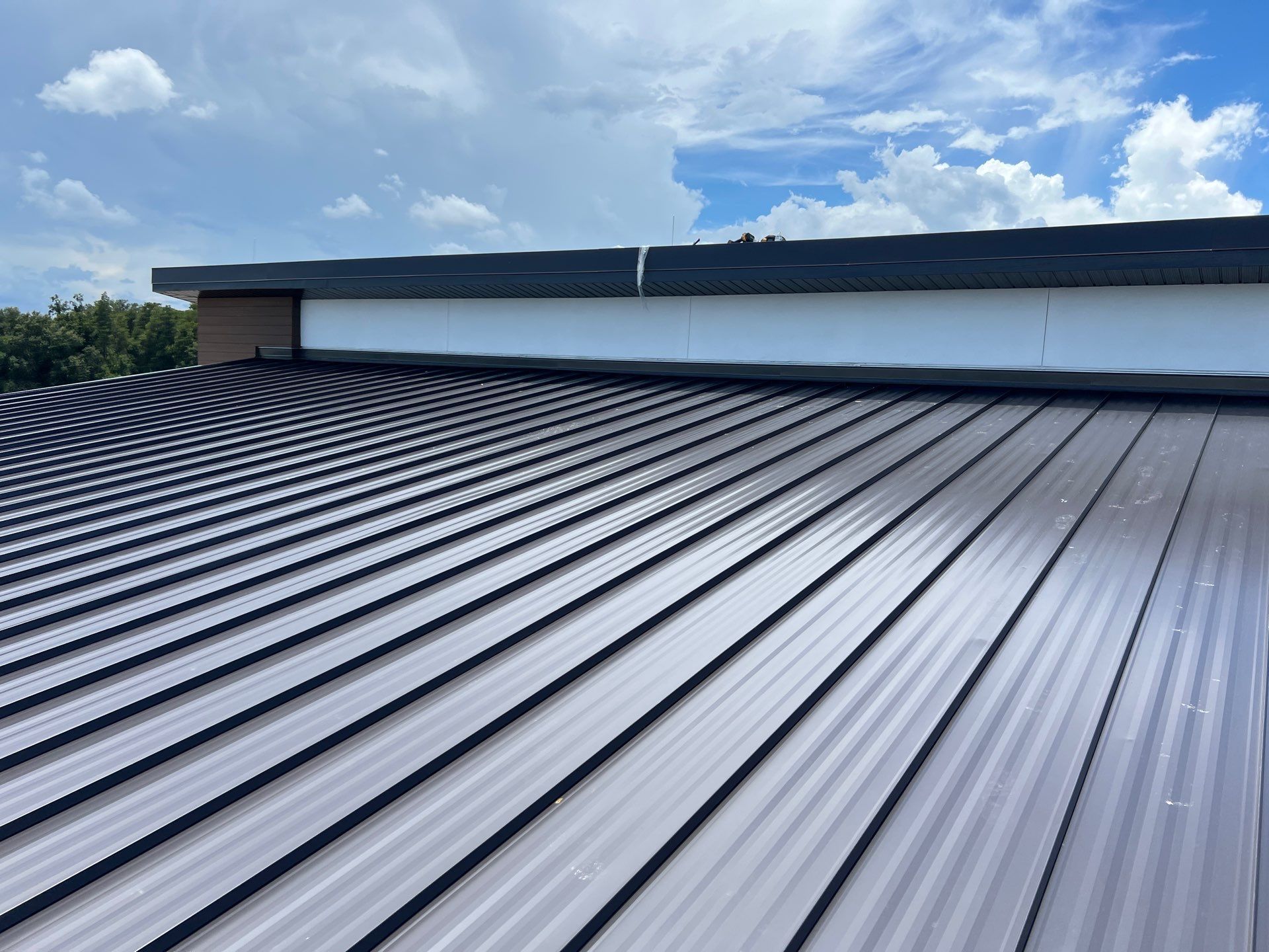 Standing seam commercial metal roof installed at ACP Office Building in San Antonio, Florida.