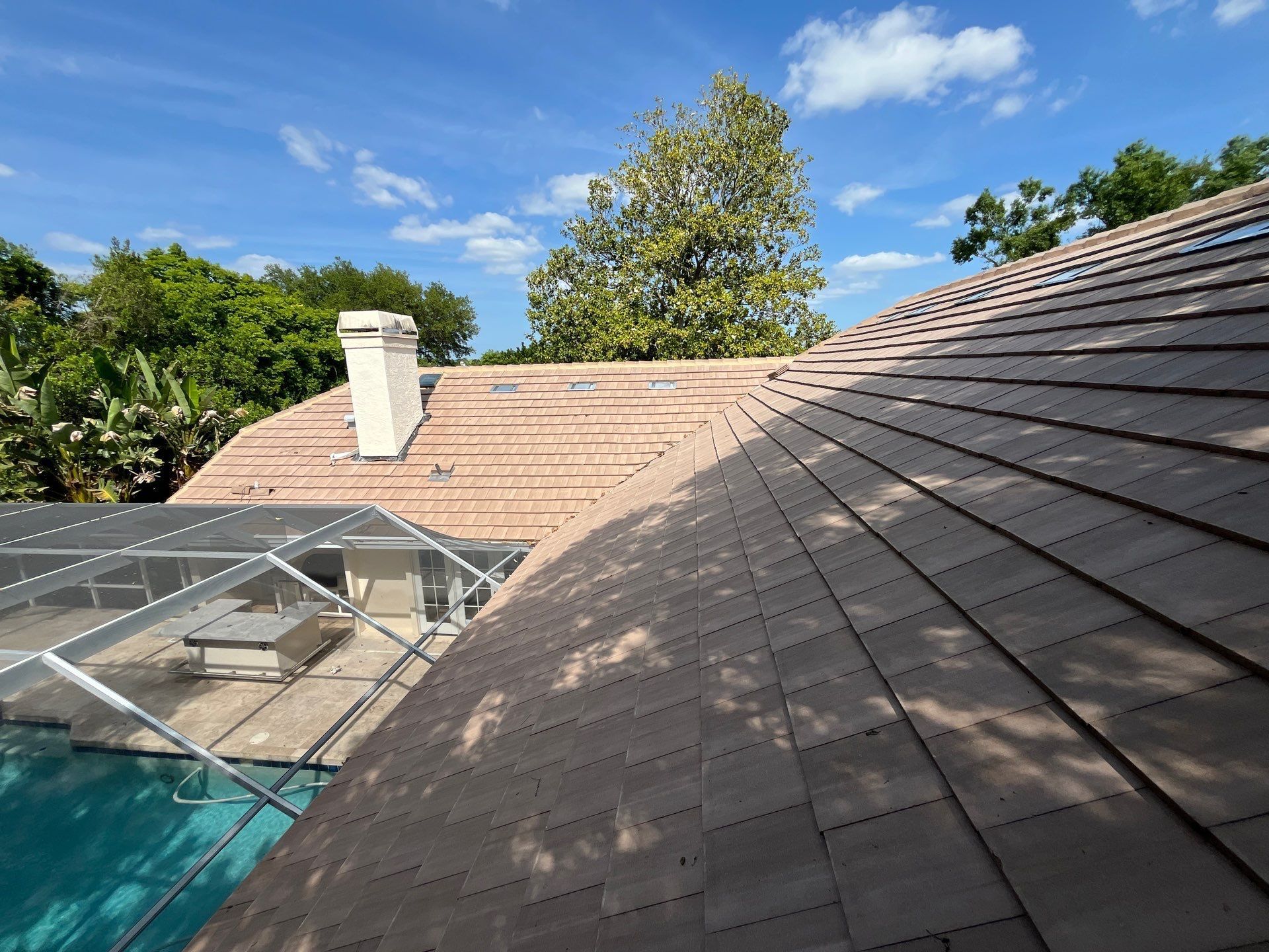 Newly installed Eagle Bel Air concrete tile roof replacement completed on a home in the Fairway Village community of Zephyrhills, Florida.
