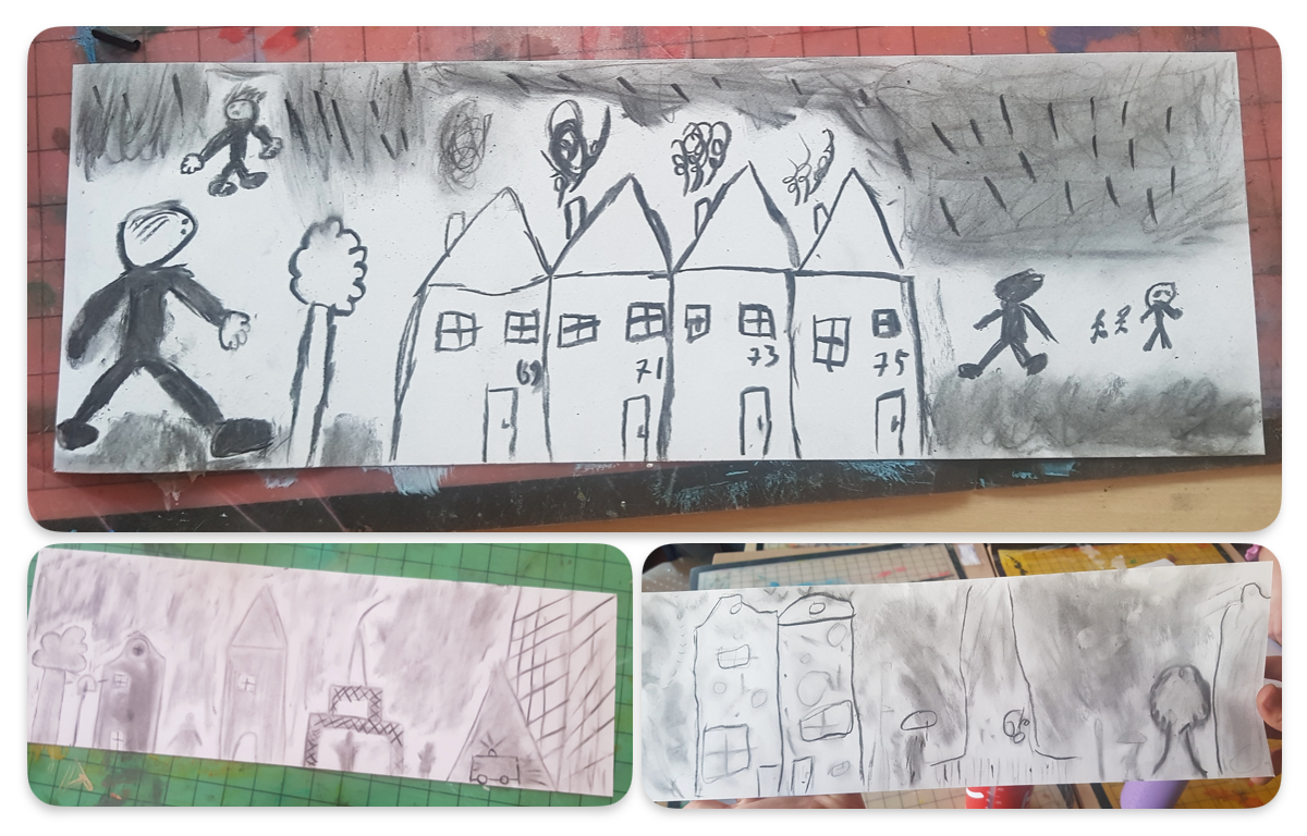 Een kindertekening van een rij huizen op een stuk papier
