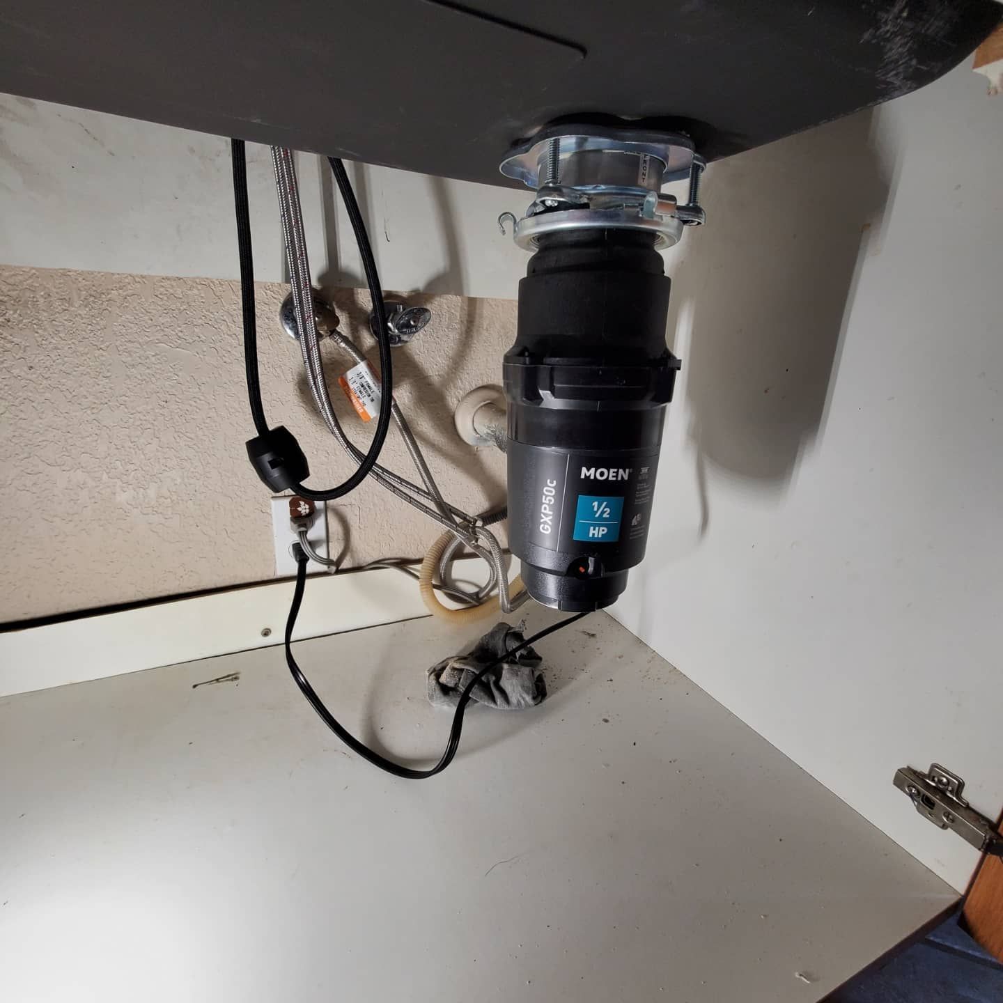 HVAC tech fixing air conditioner