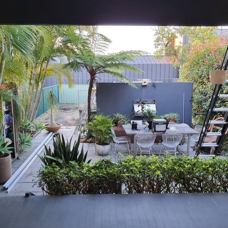 A View of a Patio With a Table and Chairs — Garden Vogue in Charlestown, NSW