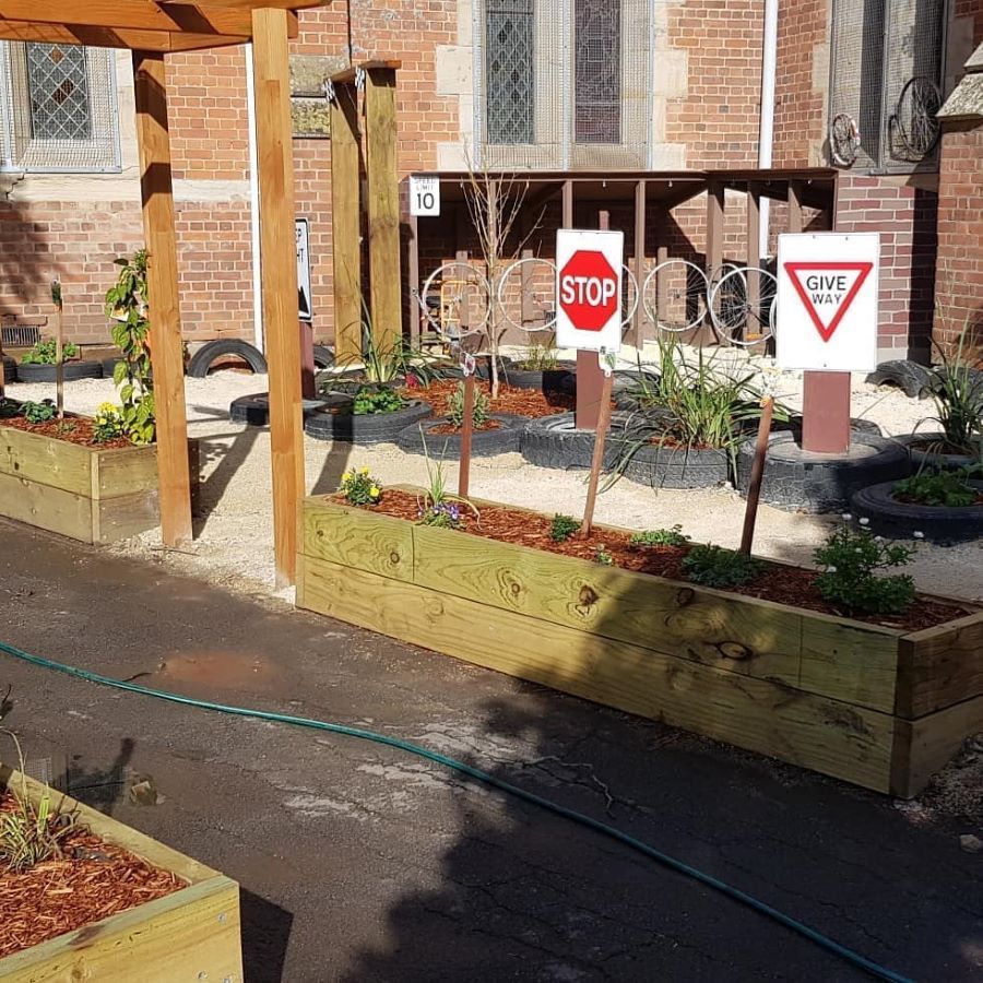 A Stop Sign is in the Middle of a Garden — Garden Vogue in Charlestown, NSW