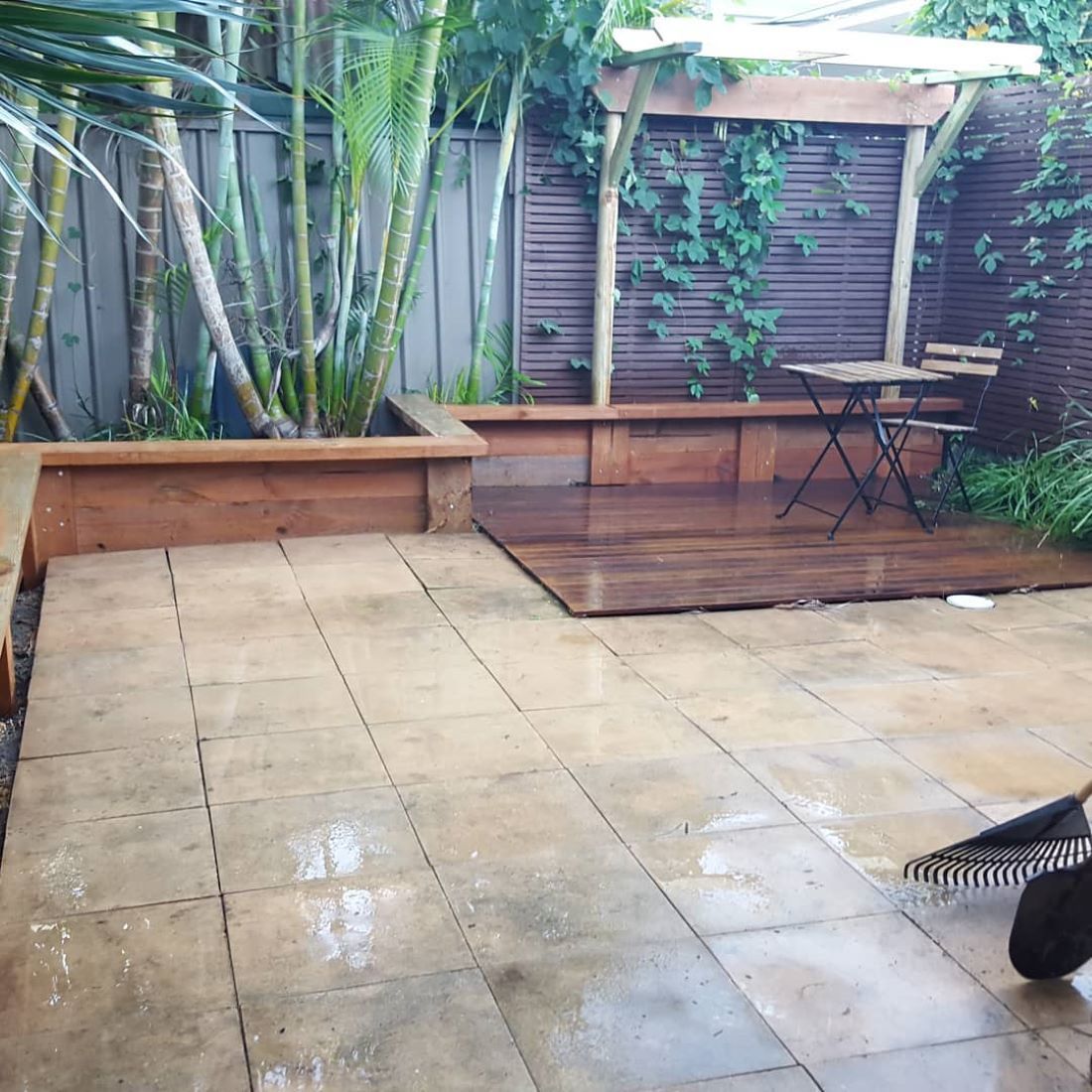 A Patio With a Table and Chairs in the Backyard — Garden Vogue in Charlestown, NSW