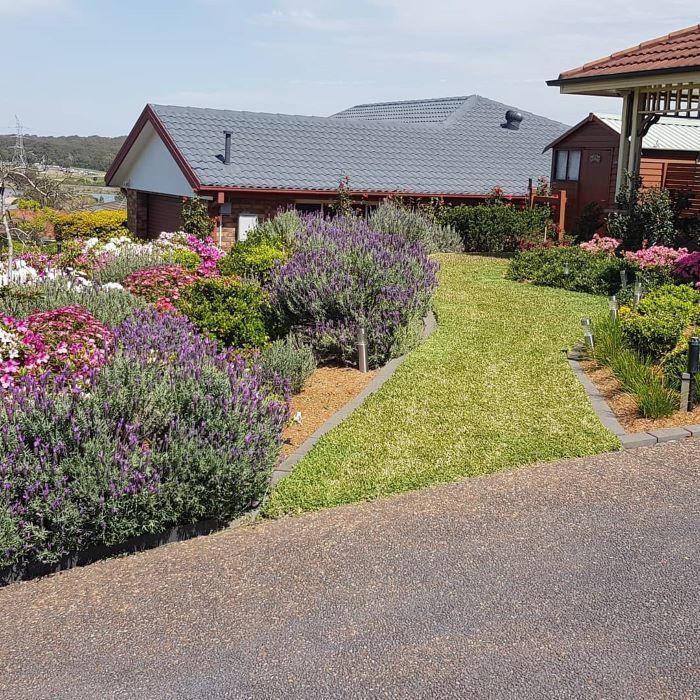 A House With a Lot of Flowers in Front of It — Garden Vogue in Lake Macquarie, NSW