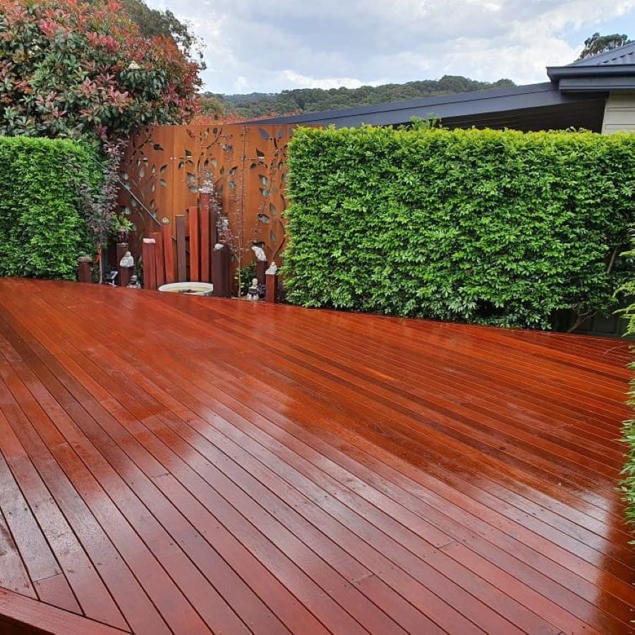A Wooden Deck With a Fence in the Background — Garden Vogue in Lake Macquarie, NSW