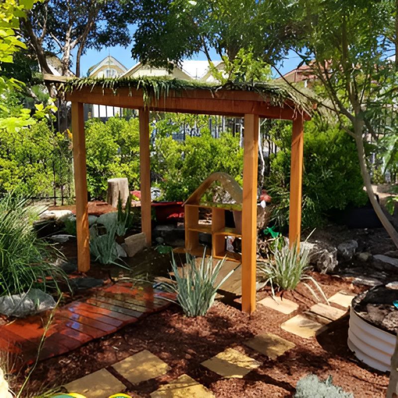 A Wooden Gazebo in the Middle of a Garden — Garden Vogue in Charlestown, NSW