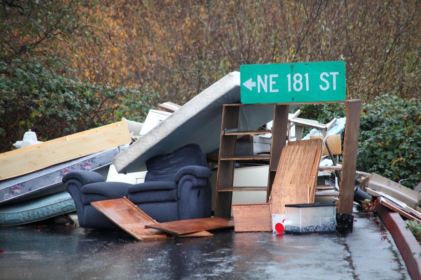 furnitures and mattresses near the road