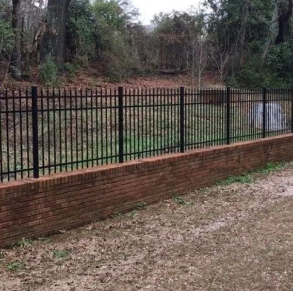 black metal picket fence