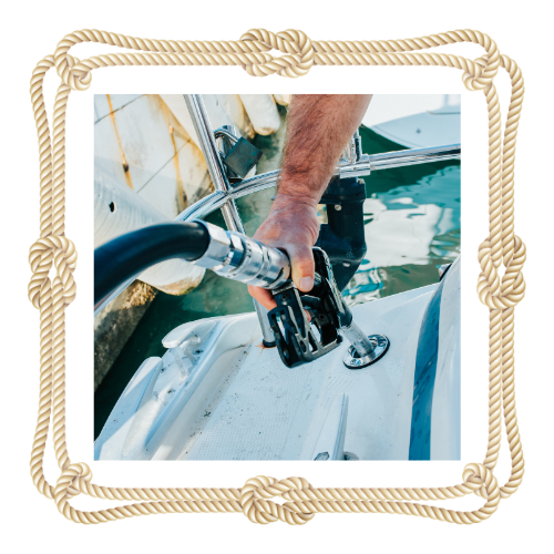 A picture of a person holding a hose on a boat