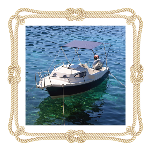 A picture of a boat in the water with a rope frame around it