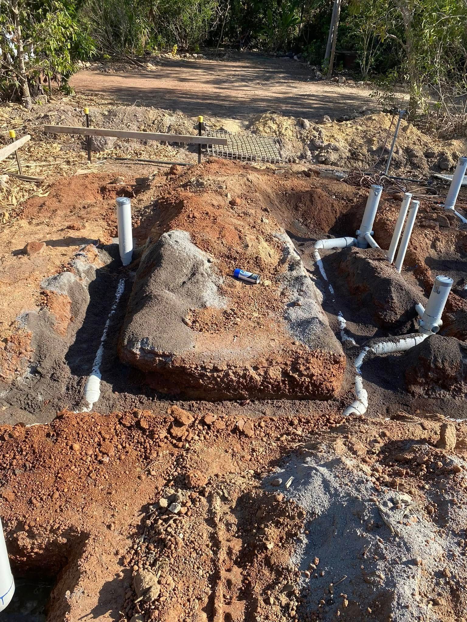 Excavation Site with Brown Soil, Pipes, and An Unfinished Structure, Outdoors — 2 Foote Plumbing & Gas in Darwin, NT