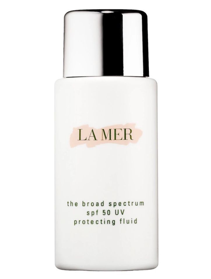 a bottle of la mer broad spectrum spf 50 uv protecting fluid