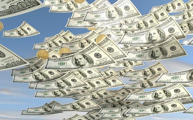 A bunch of money is falling from the sky