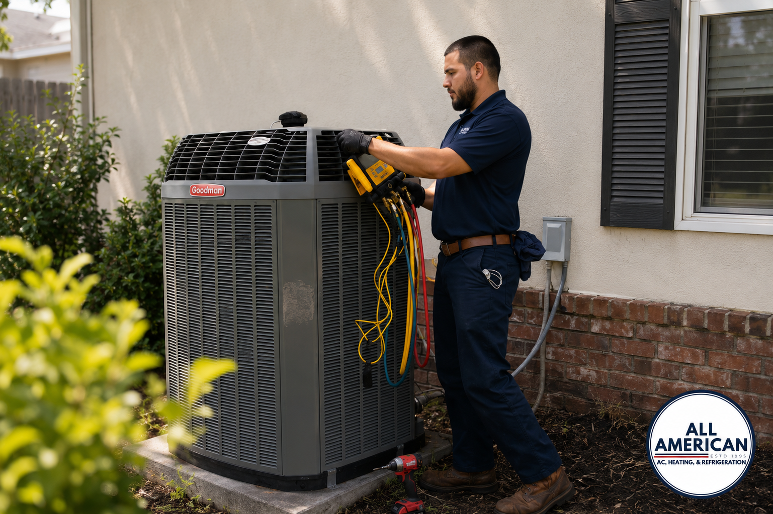 A technician is servicing wall-mounted air conditioning unit