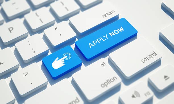 Keyboard with apply button representing applying for a uk partner visa