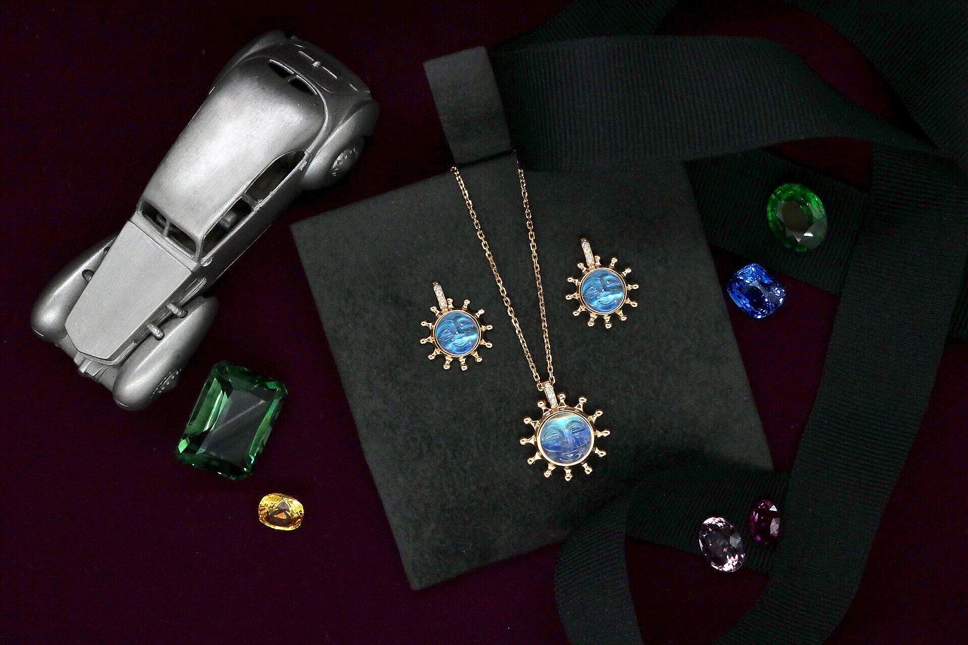 diamond and moonstone pendant and earrings
